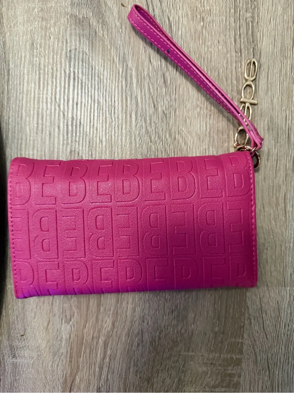 bebe Hot Pink Embossed Wristlet Clutch